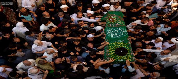 پیکر« آیتالله مهدی الخرسان» در حرم مطهر امام علی(ع) به خاک سپرده شد+عکس