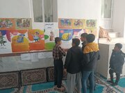 نمایشگاه عکس در روستای قادرمرز دهگلان برپا شد
