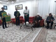 تجلیل خادمیاران رضوی از ۲ جانباز در بیرجند