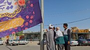 اهتزاز پرچم بارگاه ملکوتی امام رضا (ع) در میدان آزادی عنبرآباد