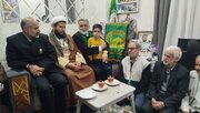 دیدار خدام حرم رضوی با خانواده شهید مدافع امنیت «مهدی کامور» در آستانه 