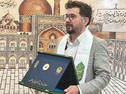 اهدای اولین مدال جهانی عکاسی به موزه رضوی