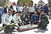 عطرافشانی گلزار شهدای خرم‌آباد به مناسبت گرامیداشت هفته شهدای خدمت