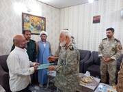 دیدار سرتیپ پاسدار شالیکار با خانواده شهید امنیت تراهی در لنگرود