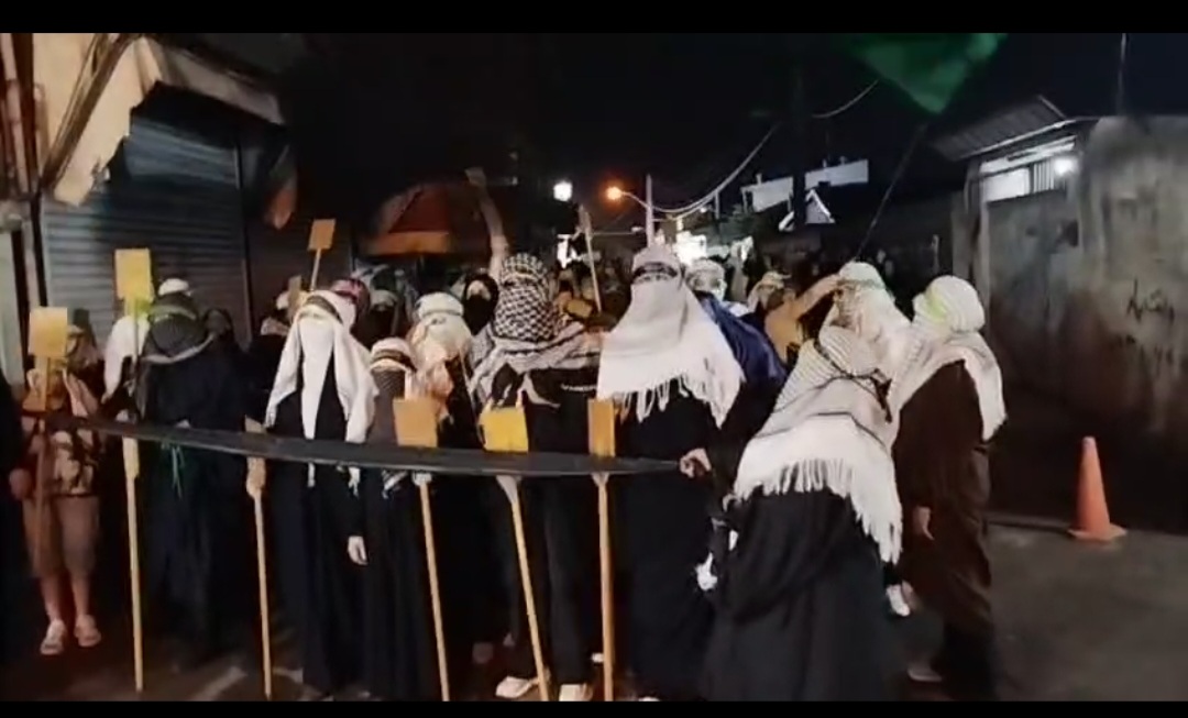 آئین تدفین شهدای کربلا توسط بانوان گیلانی با نماد قوم بنی اسد