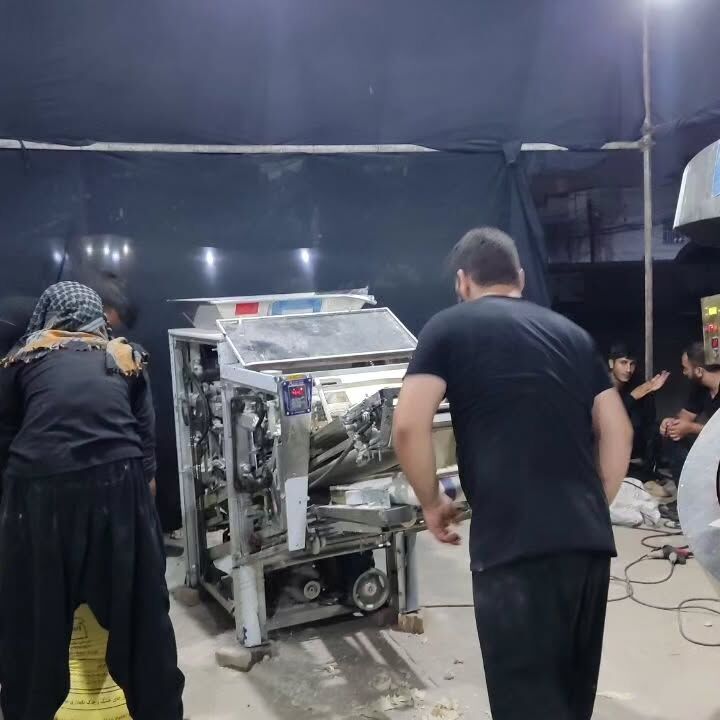 بچههای مسجد روزانه پنج تا ۱۰هزار قرص نان در نجف پخت و توزیع میکنند