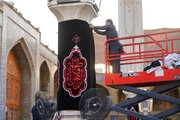 سیاه‌پوش شدن حرم مطهر علوی با آغاز ایام شهادت حضرت زهرا (س)