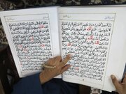 اهدای قرآن دست‌نویس بانوی تونسی به حرم امام رضا(ع)