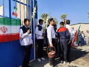 مدرسه‌ای به رنگ ایمان؛ استقبال دانش‌آموزان از شهید گمنام