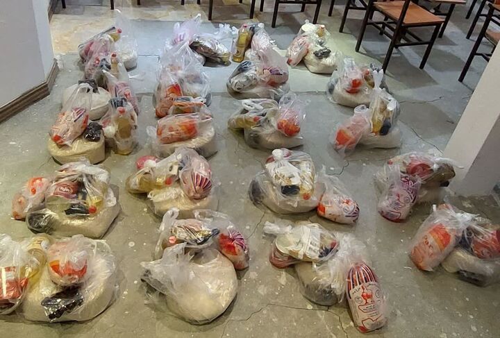 توزیع بسته‌های معیشتی و کمک‌هزینه نقدی به مددجویان بهزیستی سنندج