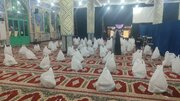 توزیع بسته های معیشتی به نیابت از امام شهید انقلاب و شهدای جنگ رمضان در بین نیازمندان  بندرعباس