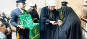 دیدار خادمان حرم حضرت معصومه(س) با خانواده شهیدان رمضان در زاهدان