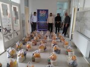 توزیع بسته‌های معیشتی در قروه همزمان با دهه کرامت