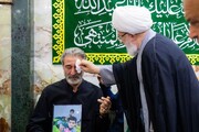 تجلیل نماینده آیت‌الله سیستانی در عراق از خانواده شهدای مدرسه میناب