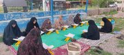 مراسم جزء‌خوانی قرآن کریم در مزار شهید شهید رمضان حسنوند