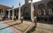آستان مطهر علوی پرچم‌های متبرک عید غدیر را به استان‌های عراق تحویل داد