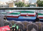 ورود خودروی حامل پیکر مطهر رهبر شهید از میدان آزادی به مسیر تشییع