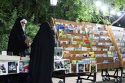 در شب‌های پاسداری از خیابان، کتابخوانی تعطیل نیست؛ میز کتاب موکب مسجد امام حسین(ع) شیراز برپا شد