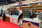 استقبال بازدیدکنندگان از غرفه آستان مقدس عباسی در نمایشگاه کتاب بغداد