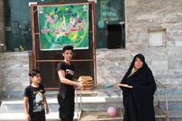 گزارش تصویری توزیع نان صلواتی برکت در رامیان