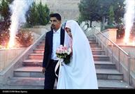 آغاز زندگی مشترک بیش از ۷۰ زوج جوان با حضور بر مزار شهید سلیمانی به روایت تصویر