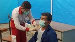 مشارکت گسترده اعضای داوطلب هلال احمر خوزستان در ۳۰ مرکز واکسیناسیون