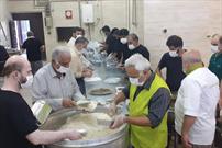 گزارش تصویری پخت و توزیع غذای گرم در بین نیازمندان به مناسبت شهادت امام رضا (ع)