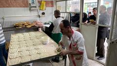 توزیع نان صلواتی در اجرای پنجمین دوره طرح ملی «قرار دوازدهم» در فسا