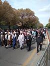 مشت های گره کرده اعضای کانون فاطمة الزهرا تبریز در راهپیمایی روز قدس