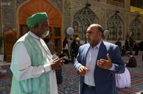 سفیر صلح یونسکو در سودان به حرم مطهر امام علی(ع) مشرف شد+ عکس