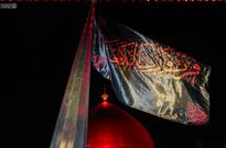 اهتزاز پرچم «فزت و رب الکعبه» در حرم امام علی(ع)/ آستان مطهر علوی سیاه پوش شد+ عکس