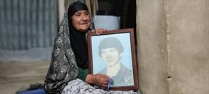 تصویری/دیدار رئیس کانون مداحان کشور با مادر شهید کریکی