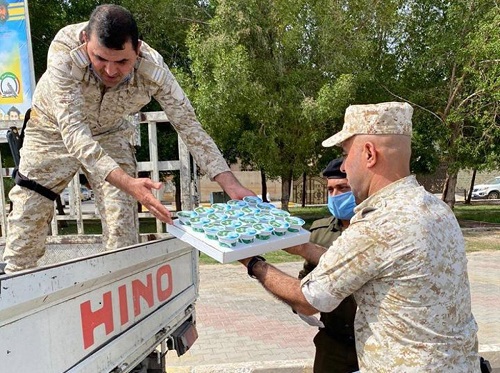 توزیع غذا توسط حشد شعبی تحت نظارت آستان قدس عباسی